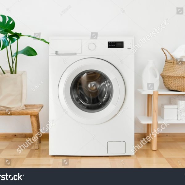 stock-photo-clothes-washing-machine-in-laundry-room-interior-1412149130